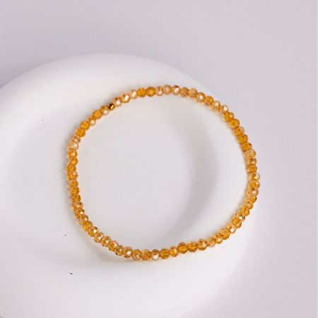 Náramek z korálků - zlatý